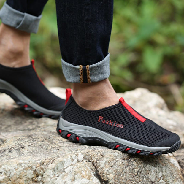 Man's sporty outdoor slip-on flat hiking tennis sneakers