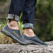 Man's sporty outdoor slip-on flat hiking tennis sneakers